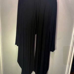 Black short back long front sweater